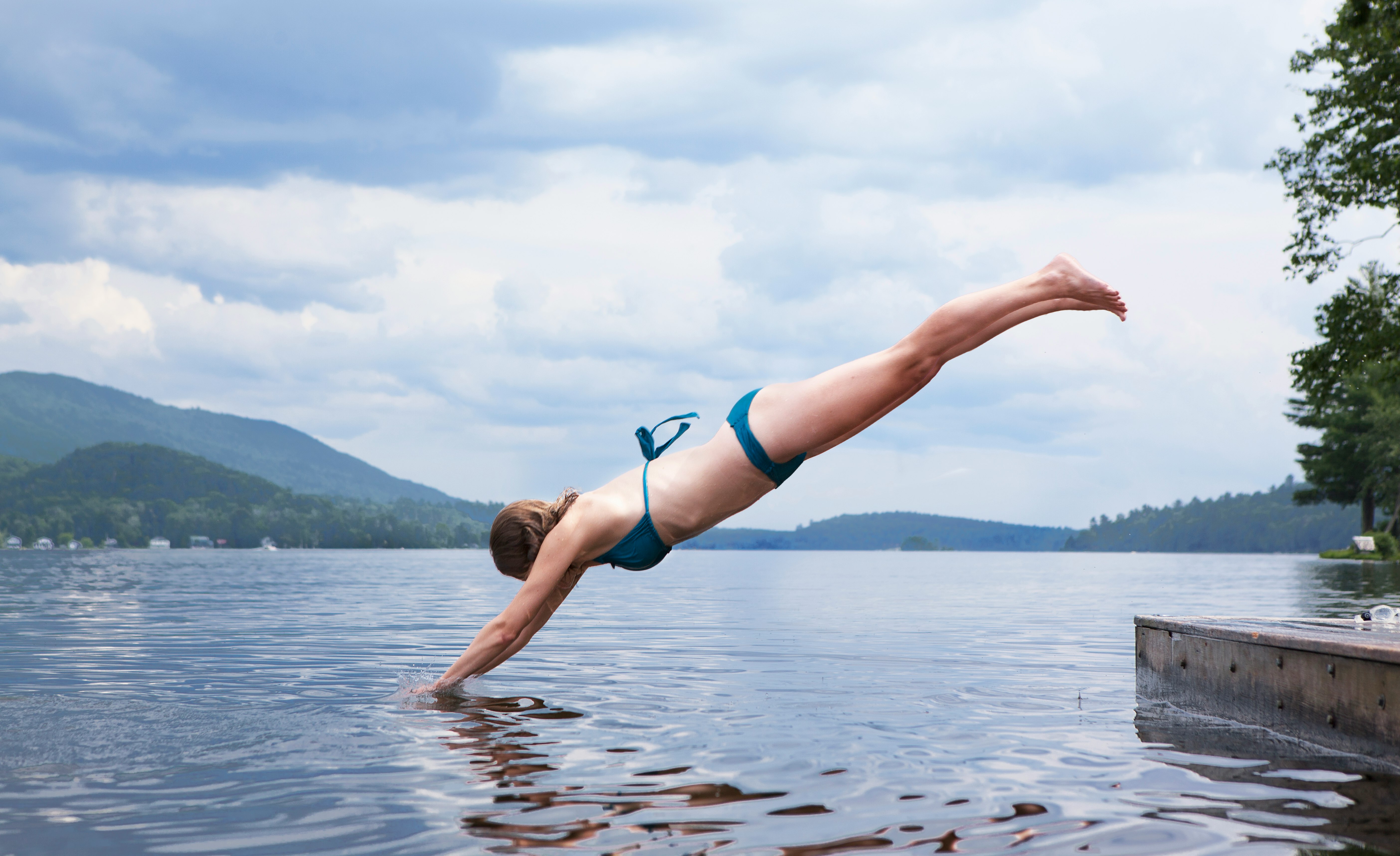 woman diving on water